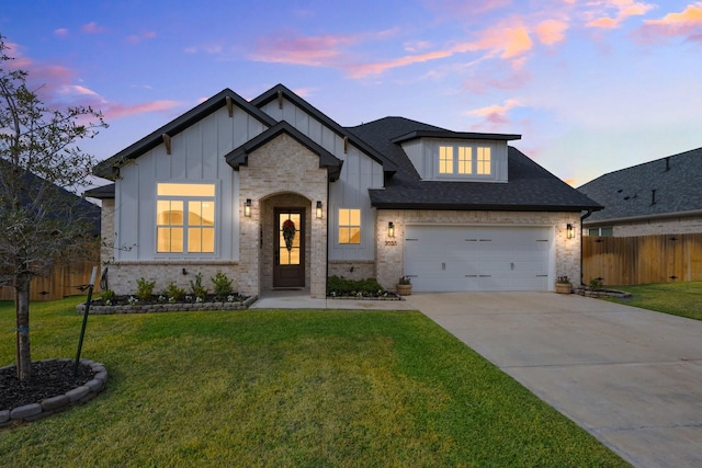 view of front of house with a yard