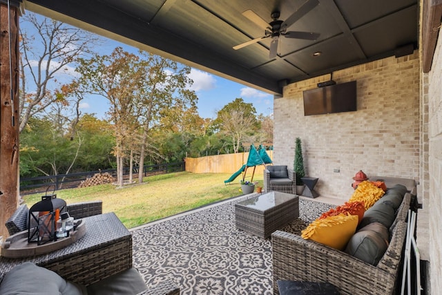 view of patio featuring ceiling fan and an outdoor hangout area