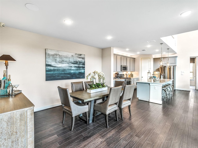 dining room featuring dark hardwood / wood-style flooring