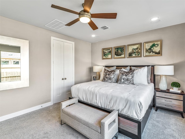 bedroom featuring carpet flooring, ceiling fan, and a closet