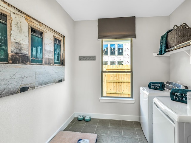 laundry area featuring tile patterned floors and washer and dryer