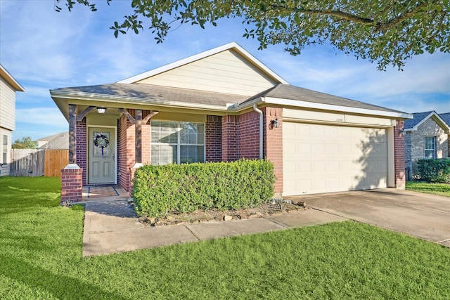 ranch-style home featuring a garage and a front lawn