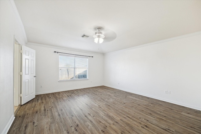 unfurnished room featuring crown molding, ceiling fan, and dark hardwood / wood-style floors