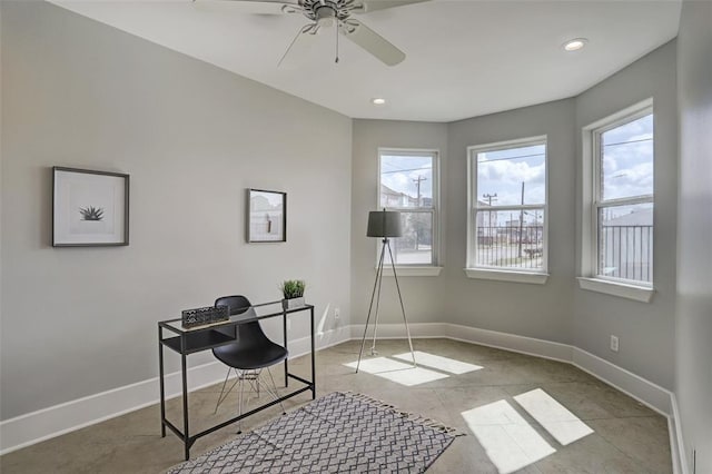 office featuring ceiling fan and light tile patterned floors