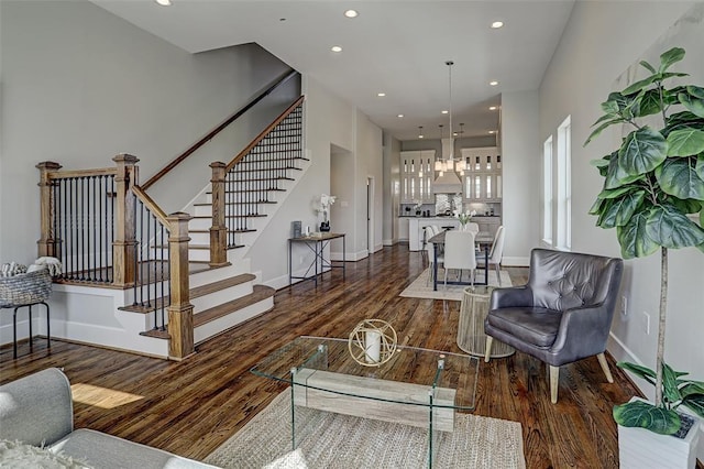 living room featuring dark wood-type flooring