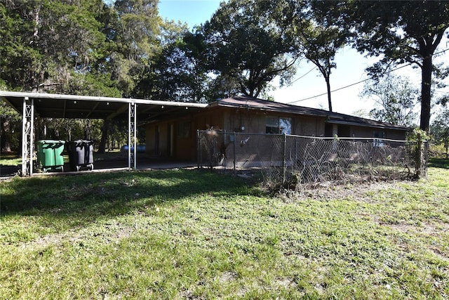 view of yard featuring a carport