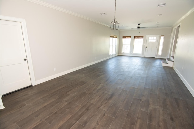 unfurnished room with ceiling fan, dark hardwood / wood-style flooring, and crown molding