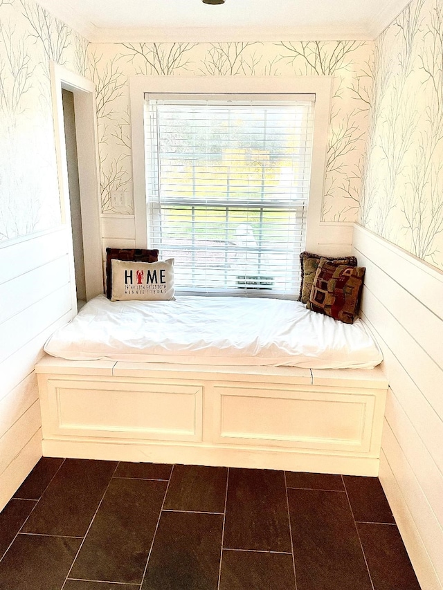 unfurnished room with dark tile patterned floors