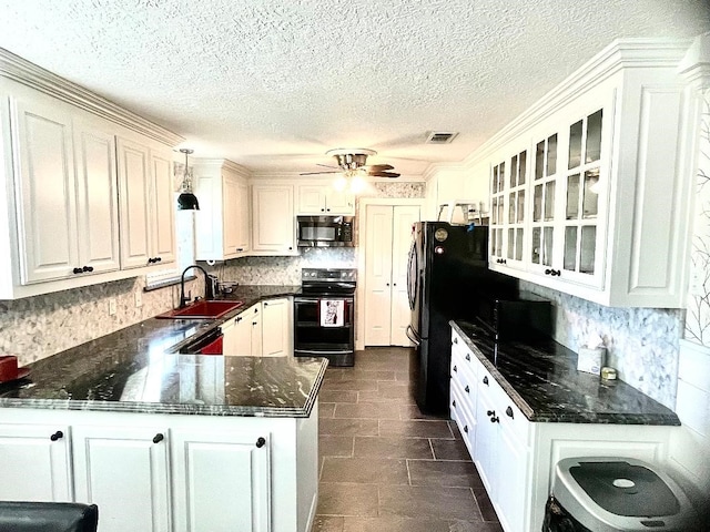 kitchen featuring white cabinetry, sink, hanging light fixtures, kitchen peninsula, and black appliances