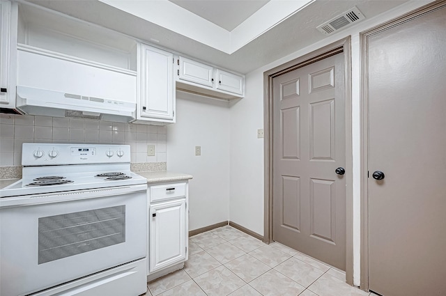 kitchen featuring white cabinetry, white range with electric cooktop, decorative backsplash, and light tile patterned flooring