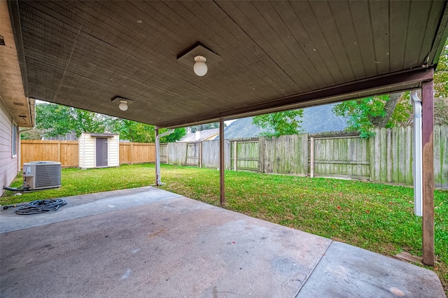 view of patio / terrace featuring a storage shed and central AC