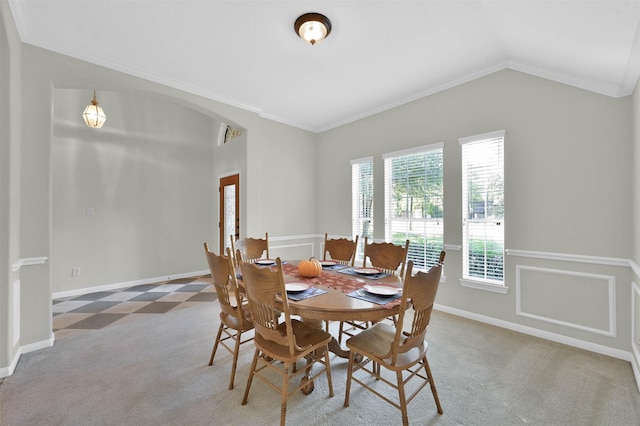 dining area with a wealth of natural light, carpet floors, and vaulted ceiling