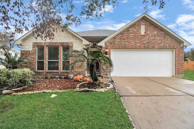 view of front of house featuring a garage and a front yard