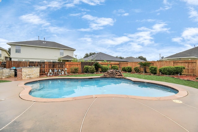 view of pool featuring a patio