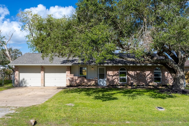 single story home with a front lawn and a garage