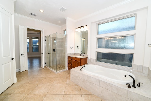 bathroom featuring crown molding, tile patterned flooring, vanity, and plus walk in shower