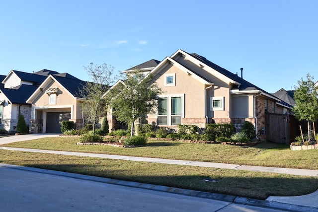 craftsman-style house featuring a front yard