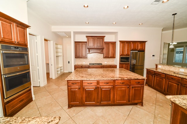 kitchen with a center island, backsplash, hanging light fixtures, ornamental molding, and appliances with stainless steel finishes