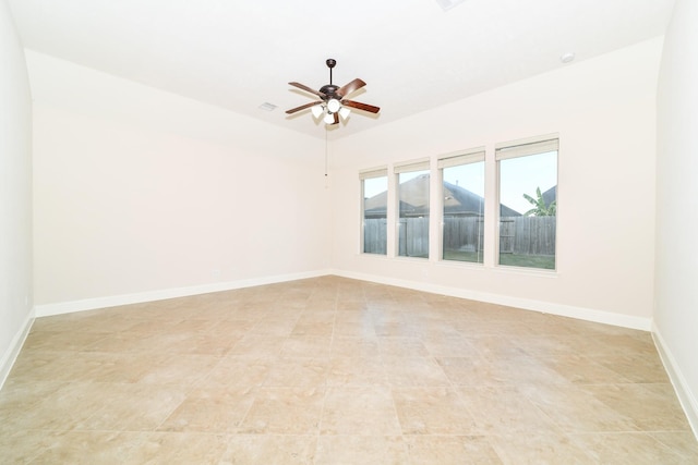 spare room with ceiling fan