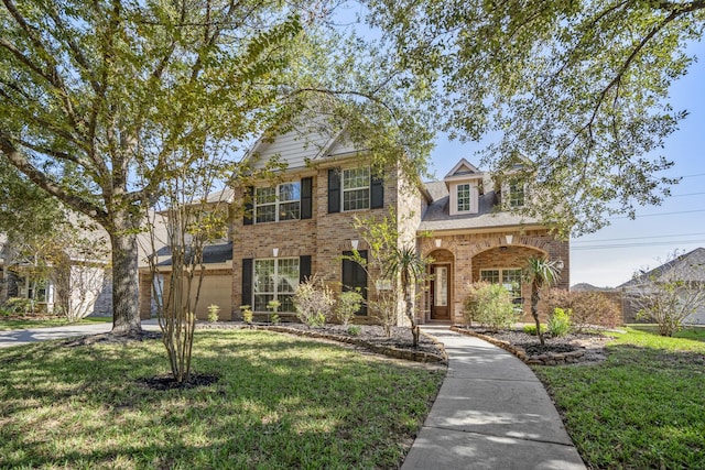 view of front of home with a front lawn