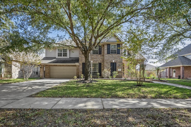 view of front of home featuring a garage and a front yard