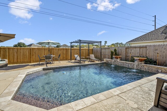 view of pool with a pergola, pool water feature, and a patio