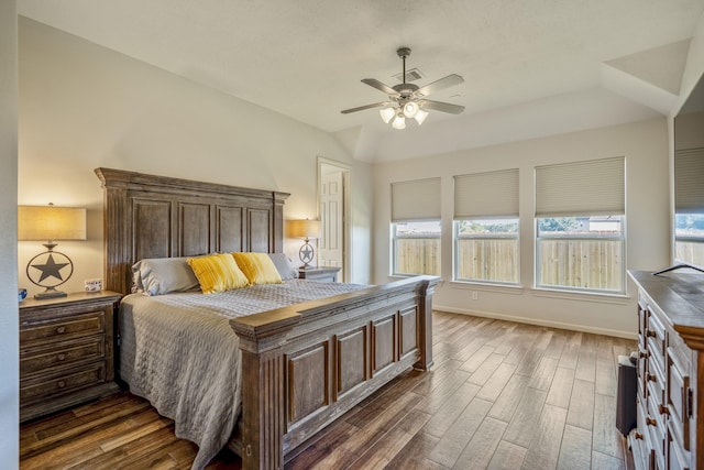 bedroom featuring ceiling fan and dark hardwood / wood-style floors