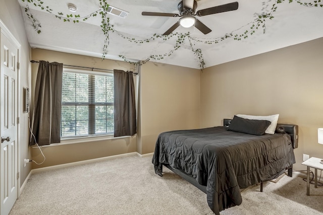 bedroom featuring carpet and ceiling fan