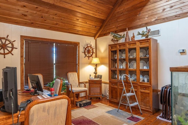 home office with light wood-type flooring, wood ceiling, and vaulted ceiling