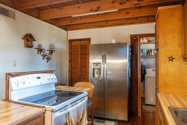 kitchen with stainless steel refrigerator with ice dispenser, electric stove, beam ceiling, wooden ceiling, and washer / clothes dryer