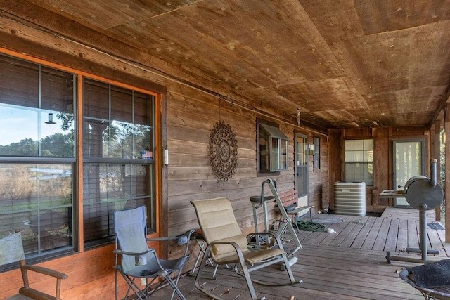 wooden terrace with a porch