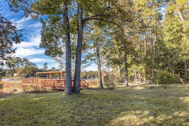 view of yard with a deck