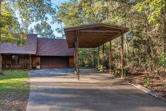 exterior space featuring a carport and a garage