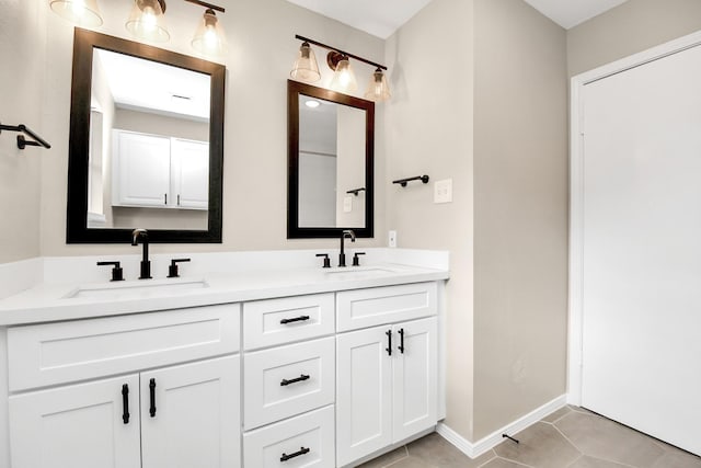 bathroom featuring tile patterned floors and vanity