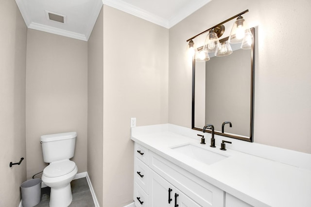 bathroom featuring crown molding, vanity, and toilet