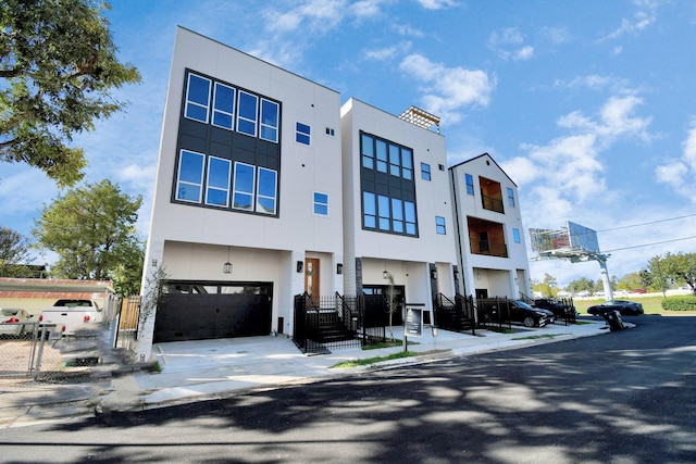 view of building exterior featuring a garage