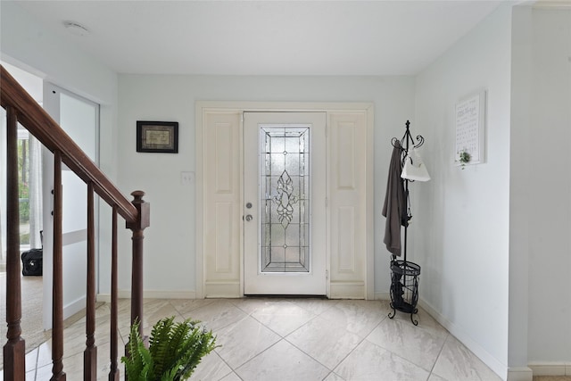 foyer with plenty of natural light