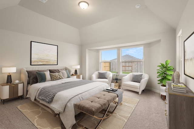 carpeted bedroom with vaulted ceiling