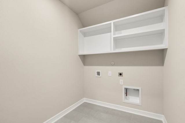 clothes washing area featuring hookup for an electric dryer, hookup for a gas dryer, light tile patterned flooring, and hookup for a washing machine