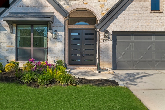 property entrance with a garage