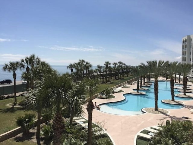 view of pool featuring a patio