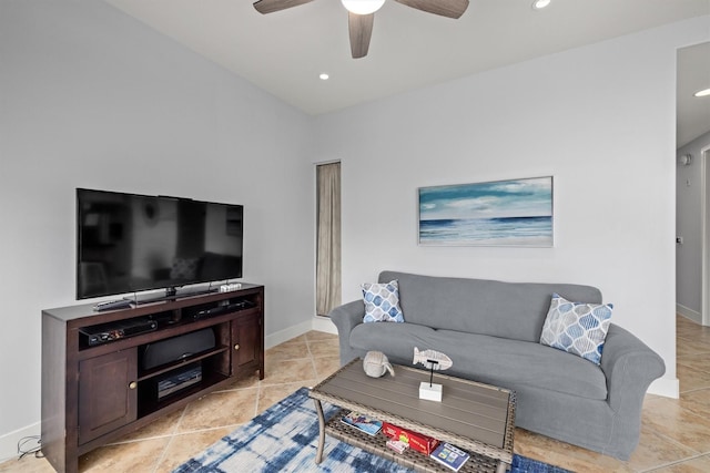 living room featuring light tile patterned floors and ceiling fan