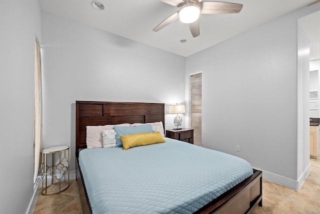 bedroom featuring light tile patterned floors and ceiling fan