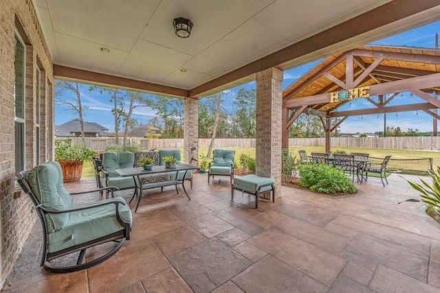 view of patio with a gazebo and an outdoor living space