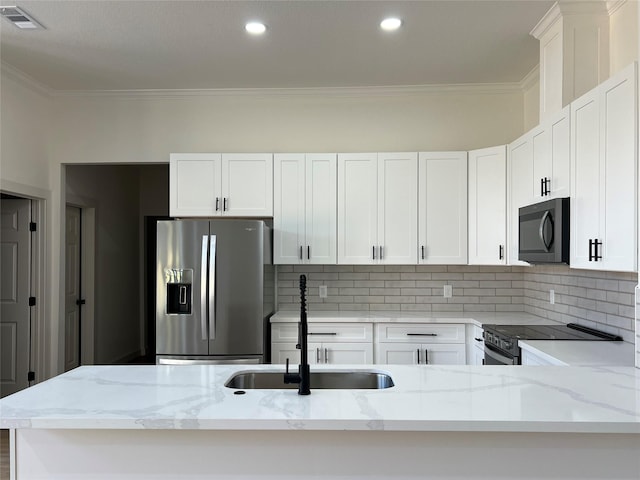 24555 Kerry St, Hempstead, TX 77445 - kitchen with stainless steel fridge with ice dispenser, black range with electric stovetop, crown molding, light stone countertops, and decorative backsplash