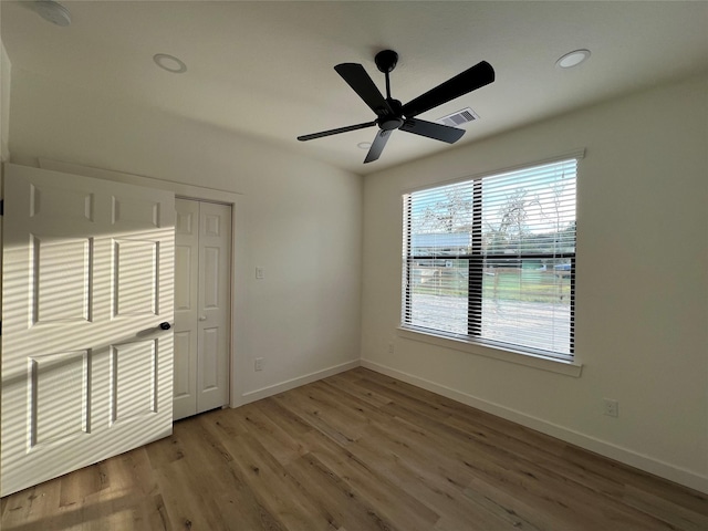 24555 Kerry St, Hempstead, TX 77445 - unfurnished bedroom featuring wood finished floors, ceiling fan, and recessed lighting