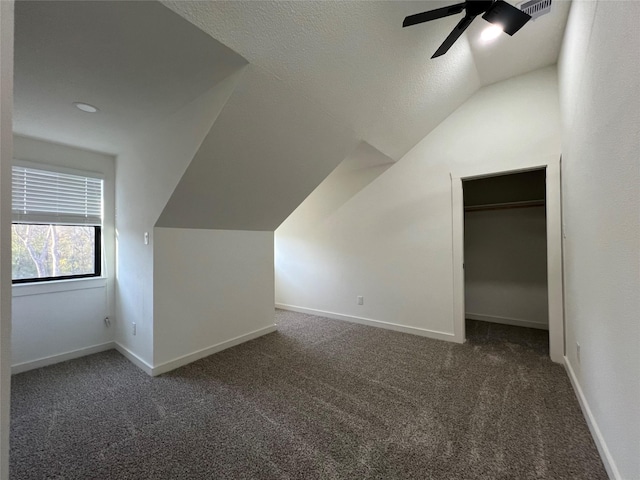 24555 Kerry St, Hempstead, TX 77445 - bonus room with ceiling fan, vaulted ceiling, carpet flooring, and a textured ceiling