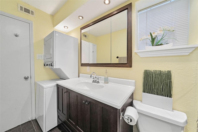 bathroom with hardwood / wood-style floors, vanity, and toilet