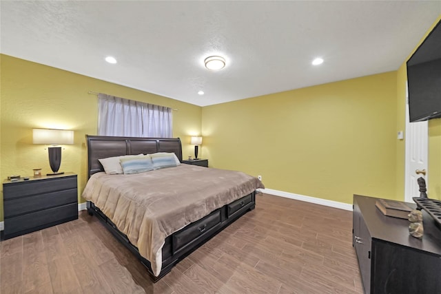 bedroom featuring hardwood / wood-style floors