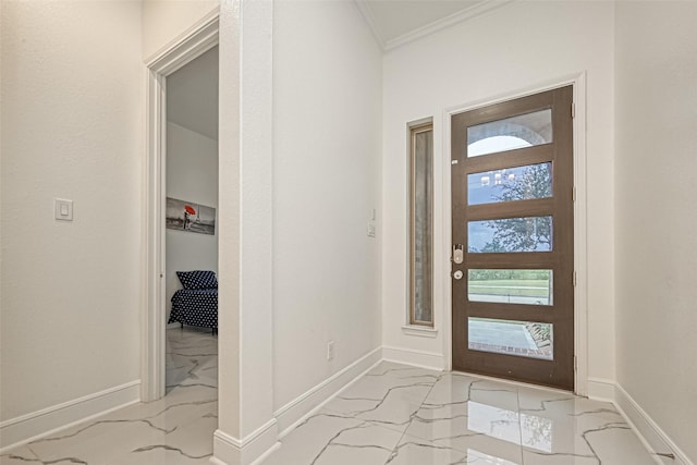 entrance foyer featuring crown molding